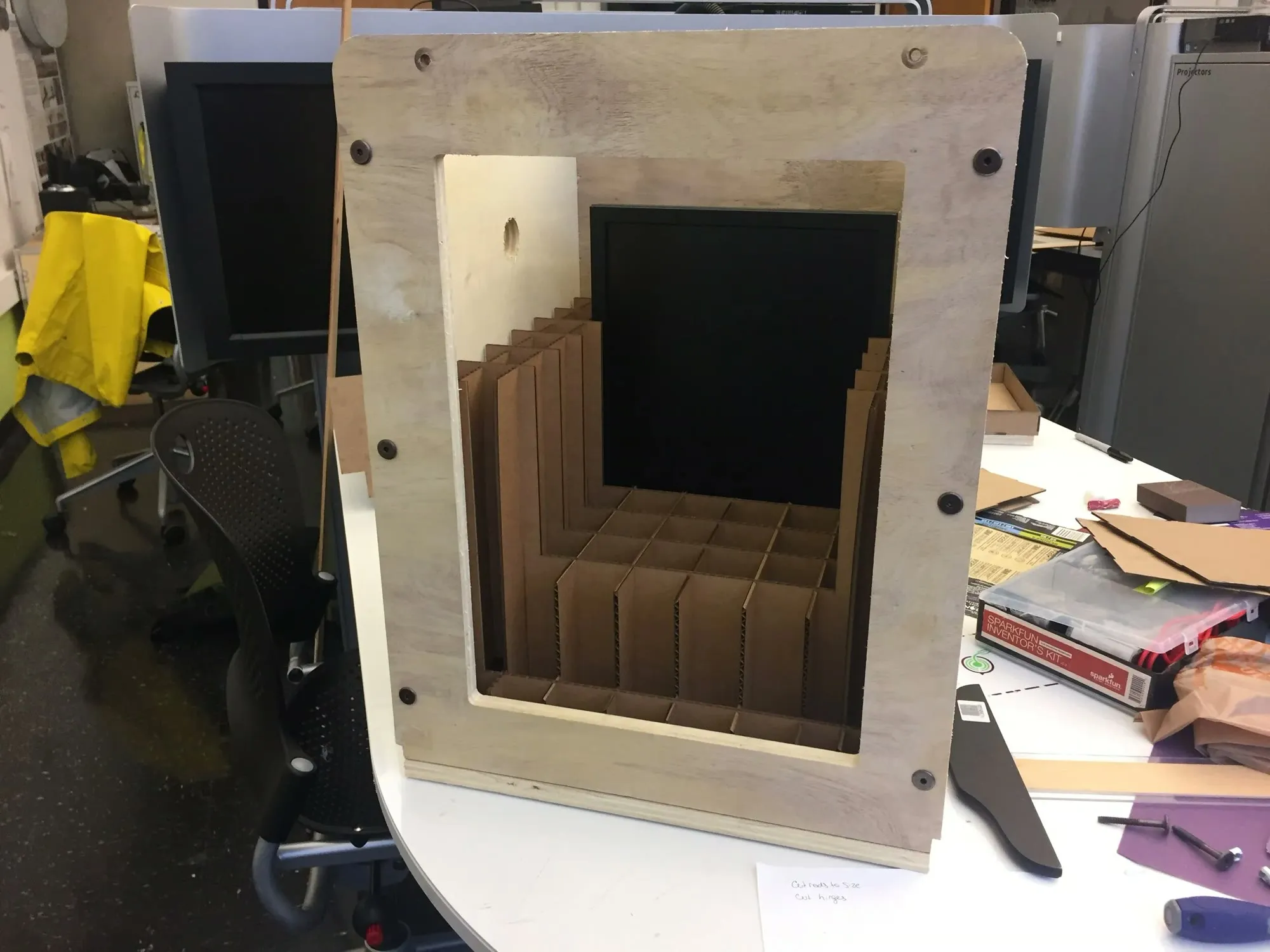 The frame built to house a screen hidden inside the safe