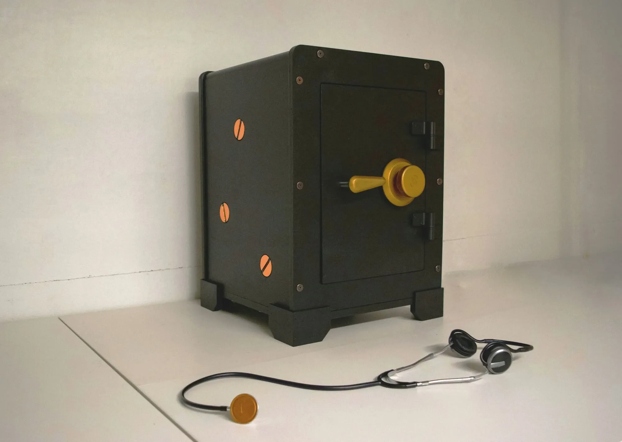 The finished Safecracker cabinet with its stethoscope and brass dial